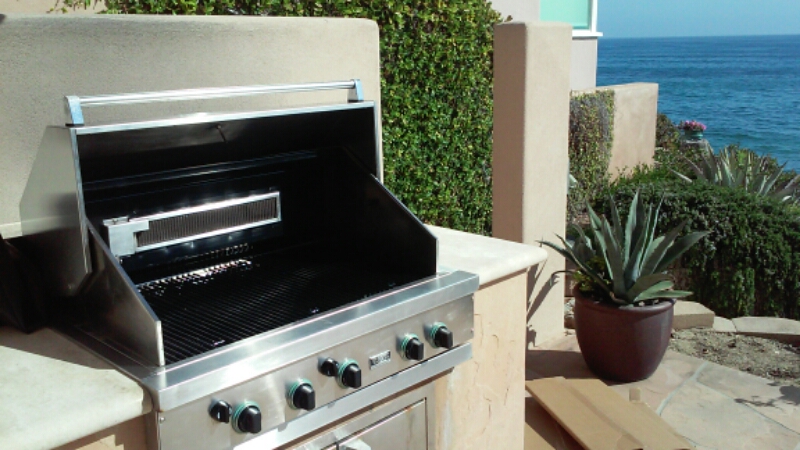 Restored stainless grill with the hood open