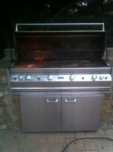 Pictured is a before image ofd a Fire Magic BBQ grill prior to the barbecue cleaning by bbq restorations of Irvine.