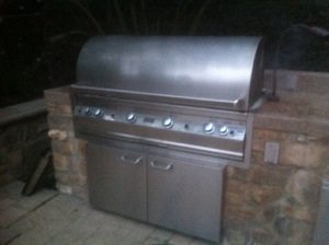 pictured is a before pic of a firemagic bbq before bbq restorations performed a pro cleaning on it