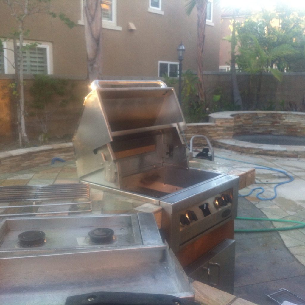pictured is a bbq repair in irvine & a bbq cleaning done by bbq restorations